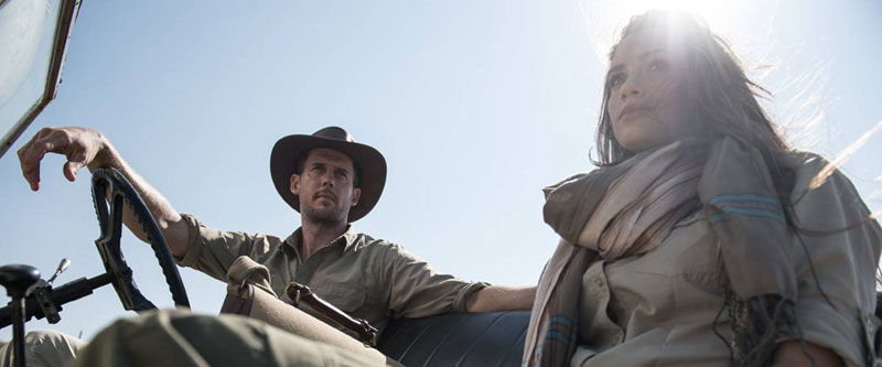 Man & woman in safari clothing with sun protection